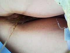 Arousing images in high details with hairy pussy sitting on the toilet...